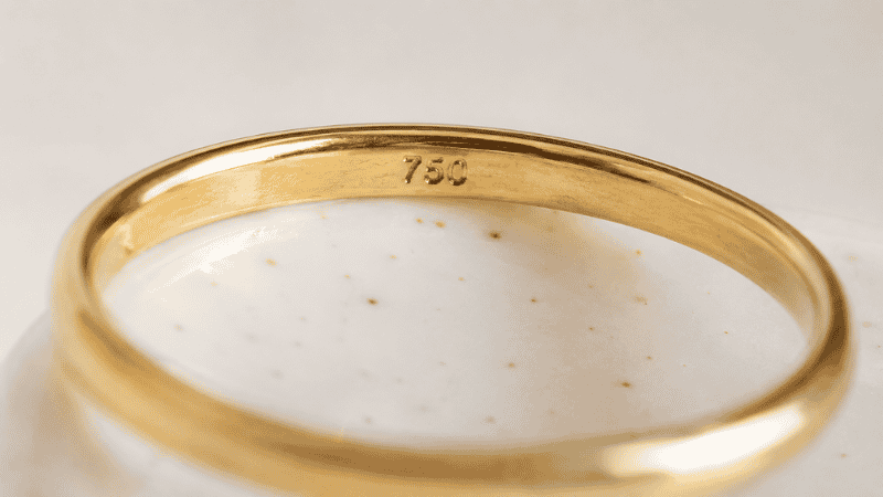 gold hallmark stamp 750 on inside of 18k gold ring band