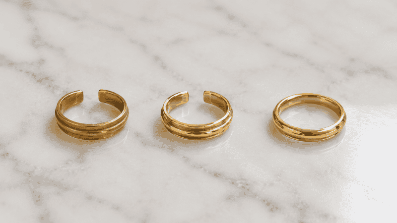 comparison of gold plated, gold vermeil, and solid gold jewelry pieces side by side
