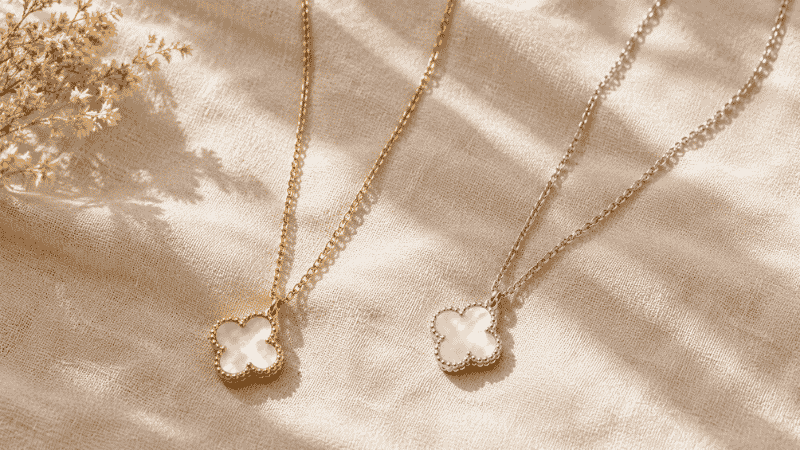 gold vs silver jewelry comparison for skin tone — warm yellow gold chain next to cool sterling silver chain