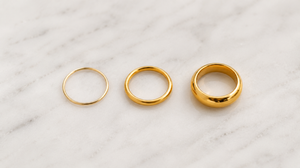 gold plated vs gold vermeil vs gold filled jewelry comparison — three rings showing durability and gold tone differences