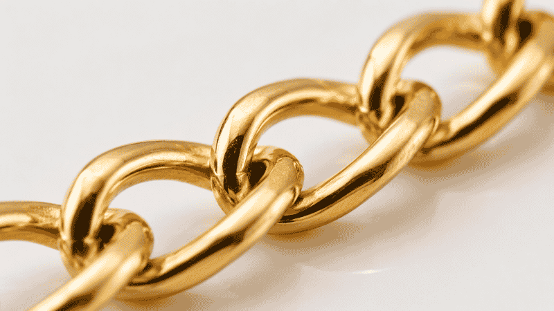 close-up of gold vermeil chain showing thick gold plating layer over sterling silver base